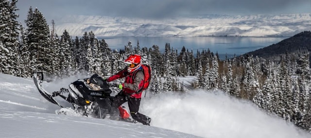 Snowmobiling in the mountains above Bear Lake