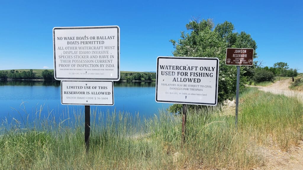 Johnson Reservoir signs of rules for boats and fishing in Preston Idaho